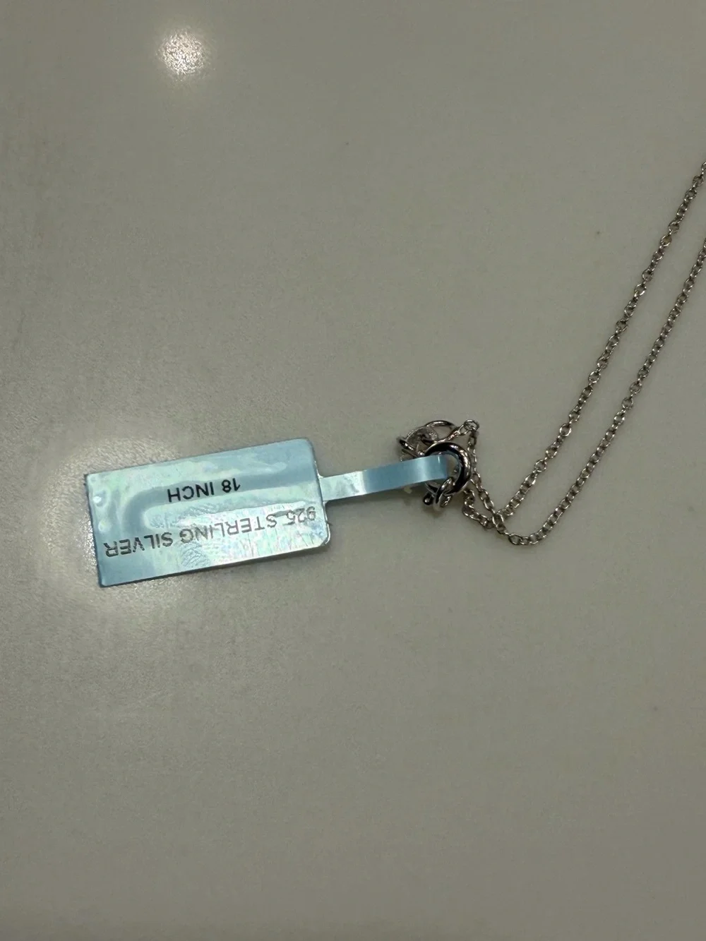 Sterling Silver Cross Pendant Necklace in London Blue Topez 9 inches long